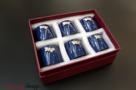 Set of 6 dark blue napkin rings attached with butterfly